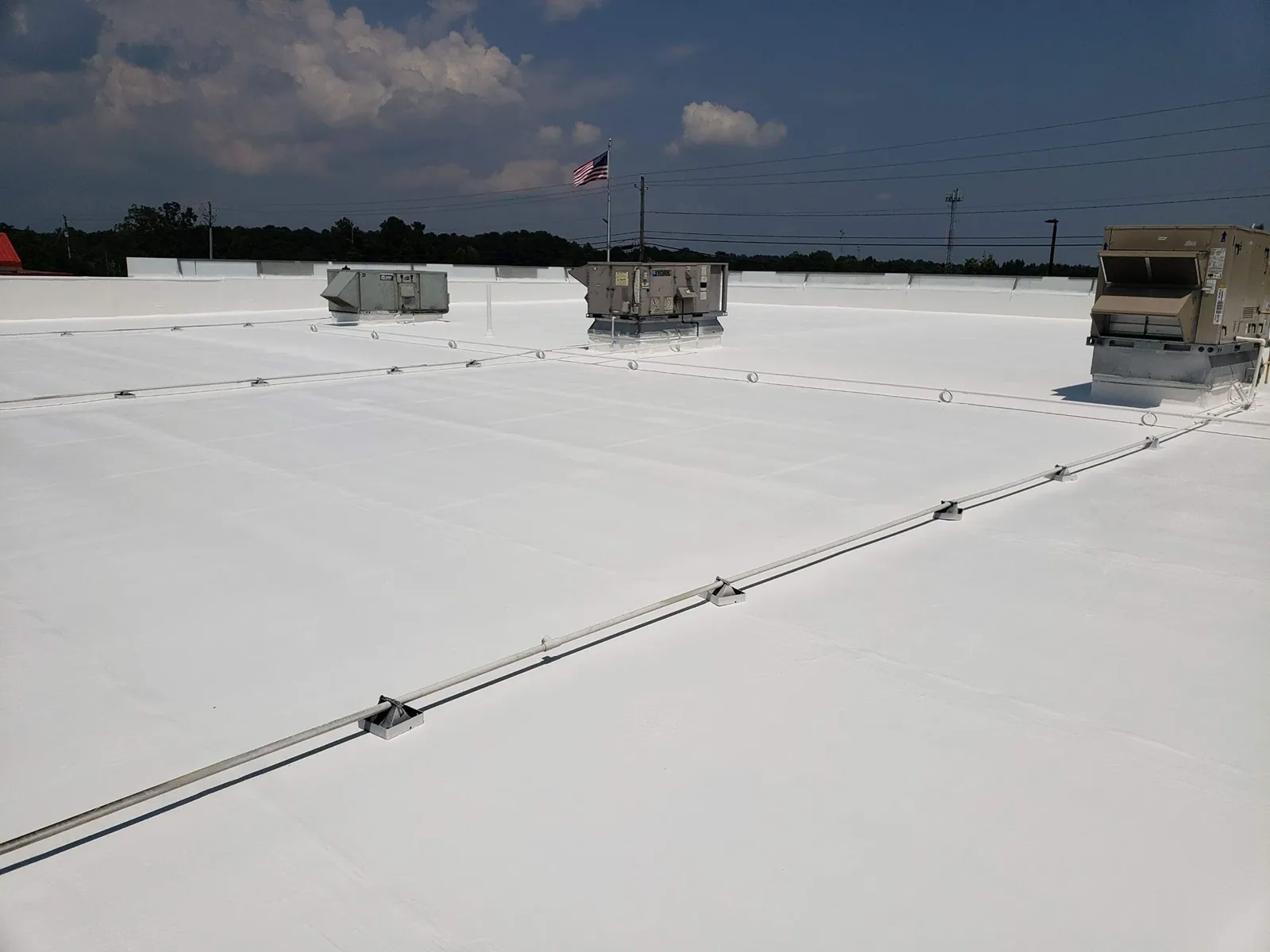 Occupied Commercial Building Reroofing in Grand Prairie, TX